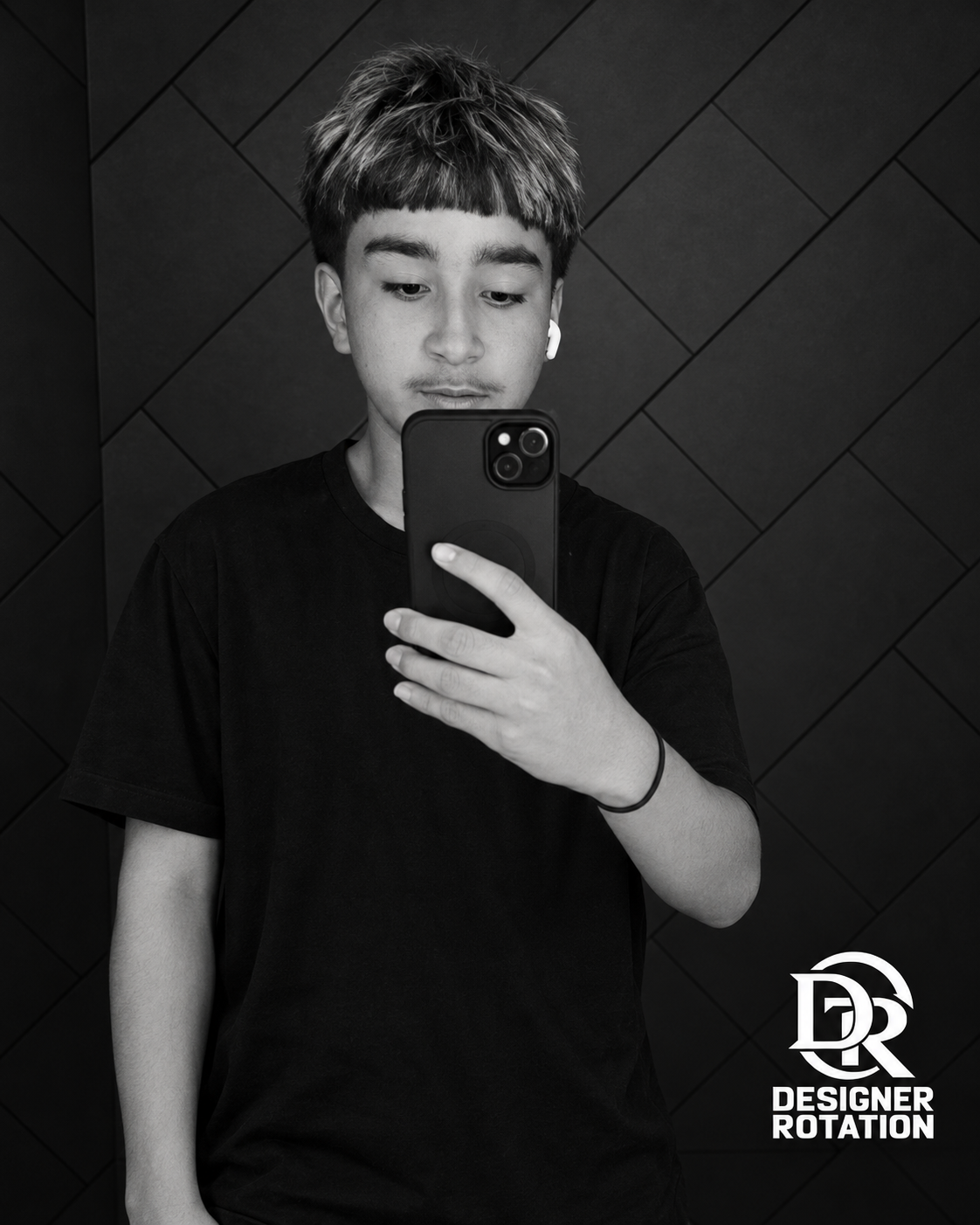Benicio Giovanni Zabaleta, founder of Designer Rotation, in a black-and-white mirror portrait